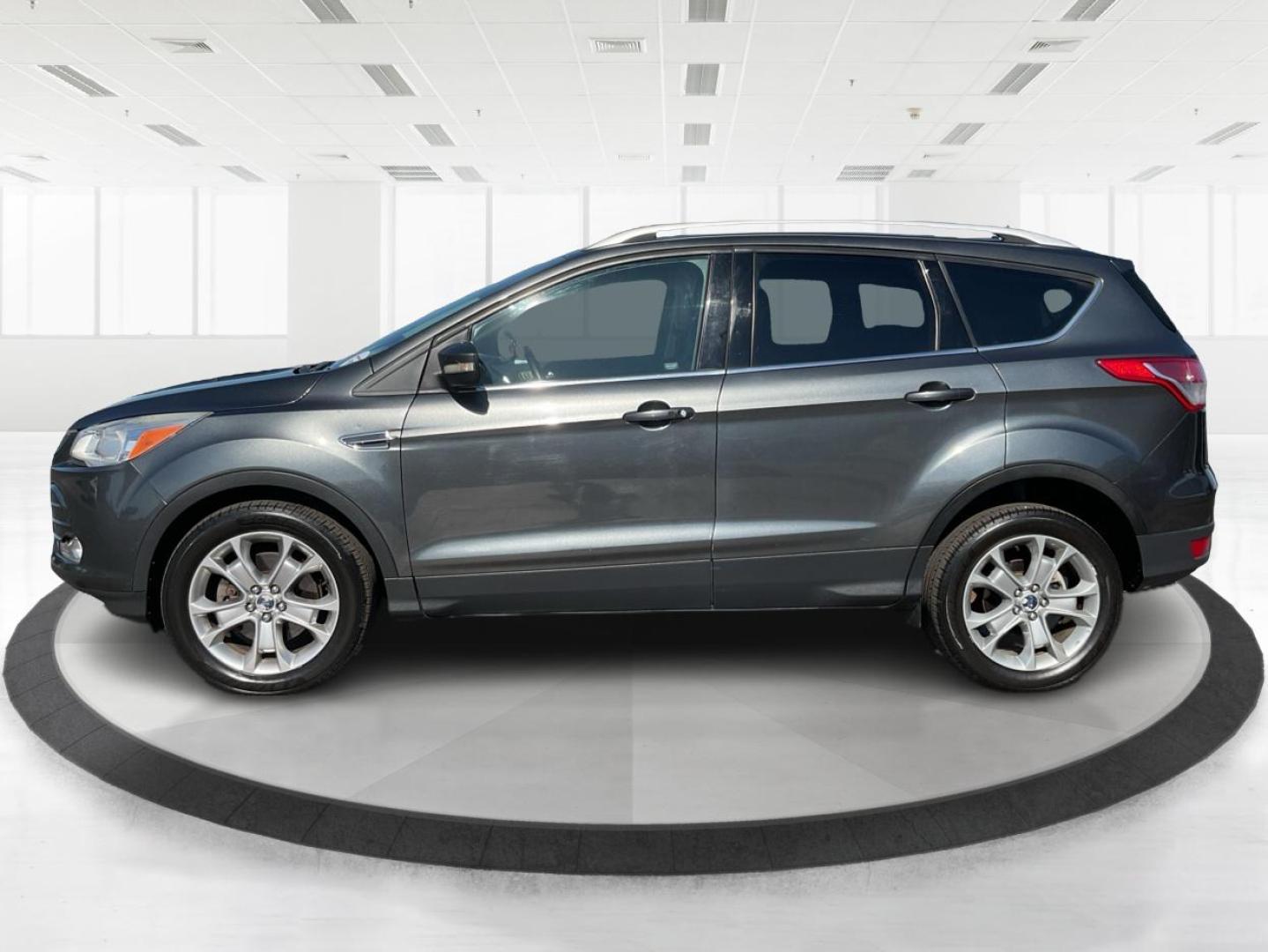 2016 Ford Escape Titanium (1FMCU9J92GU) with an EcoBoost 1.6L I-4 gasoline direct injection engine, located at 1184 Kauffman Ave, Fairborn, OH, 45324, (937) 908-9800, 39.807072, -84.030914 - Photo#5