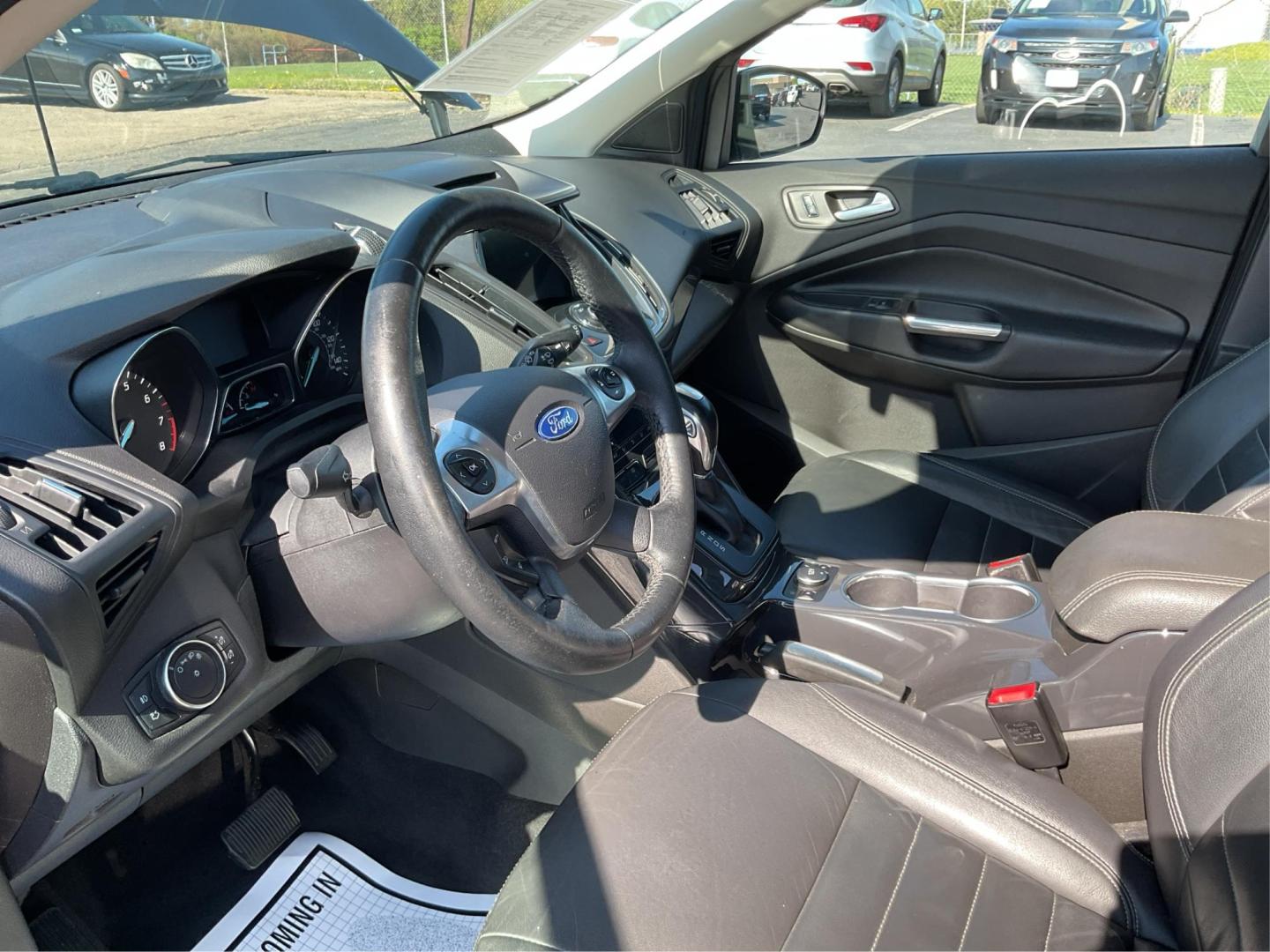 2016 Ford Escape Titanium (1FMCU9J92GU) with an EcoBoost 1.6L I-4 gasoline direct injection engine, located at 1184 Kauffman Ave, Fairborn, OH, 45324, (937) 908-9800, 39.807072, -84.030914 - Photo#8