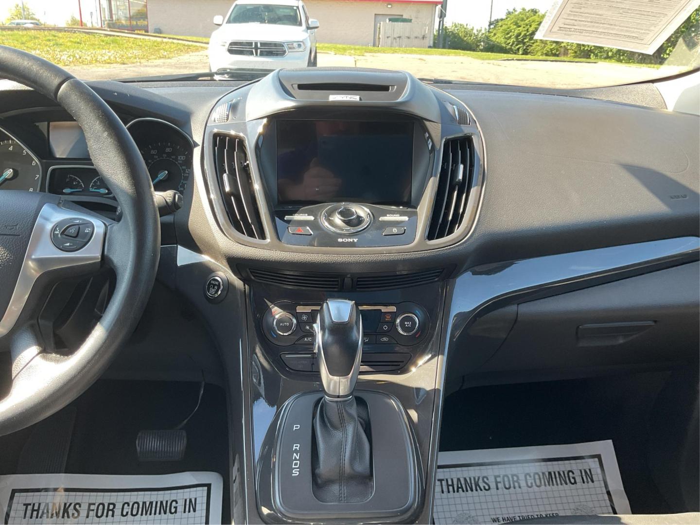2016 Ford Escape Titanium (1FMCU9J92GU) with an EcoBoost 1.6L I-4 gasoline direct injection engine, located at 1184 Kauffman Ave, Fairborn, OH, 45324, (937) 908-9800, 39.807072, -84.030914 - Photo#12