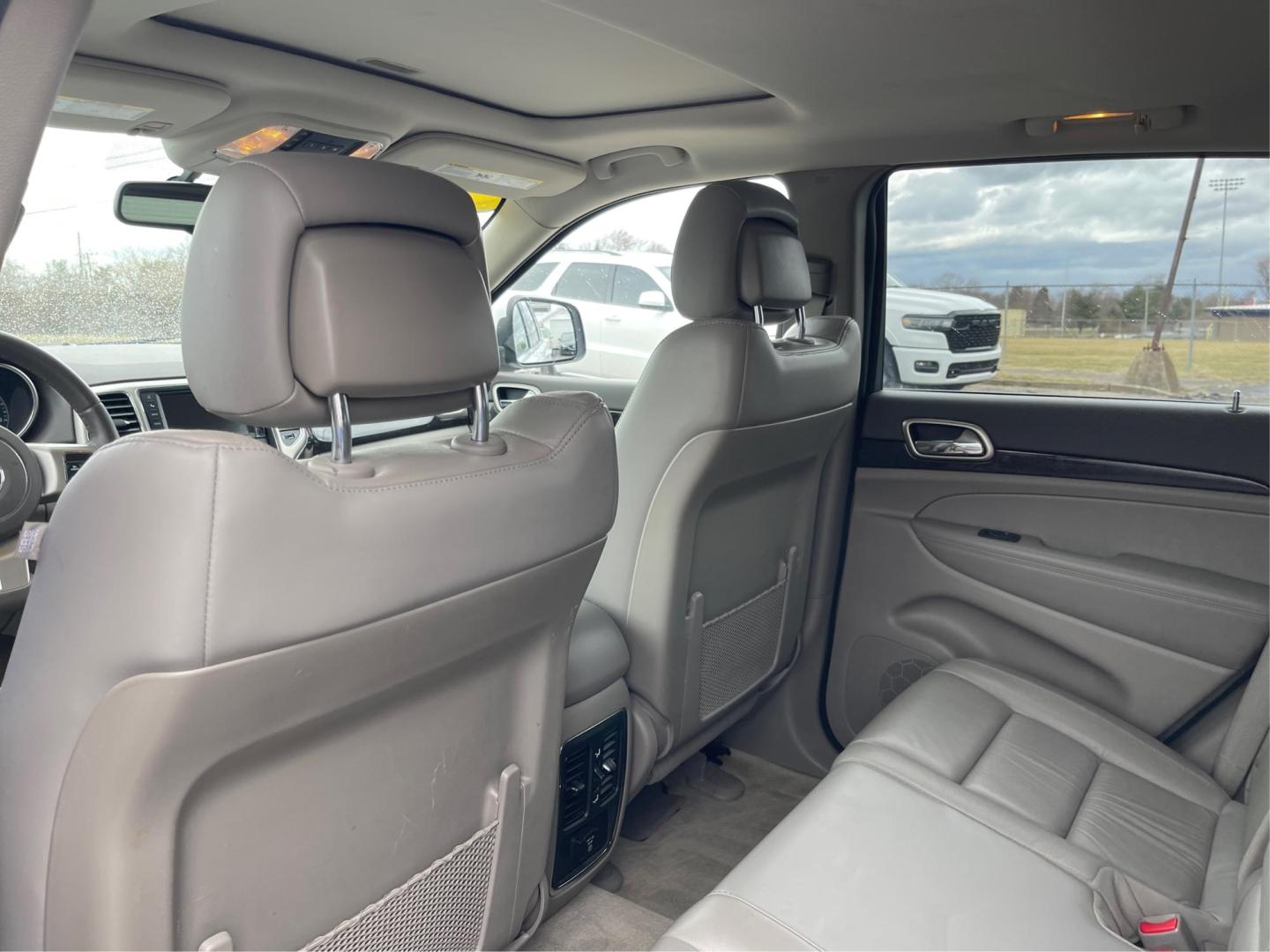 2013 Jeep Grand Cherokee Laredo (1C4RJFAG8DC) with an 3.6L V-6 DOHC engine, located at 880 E. National Road, Vandalia, OH, 45377, (937) 908-9800, 39.891918, -84.183594 - Photo#9