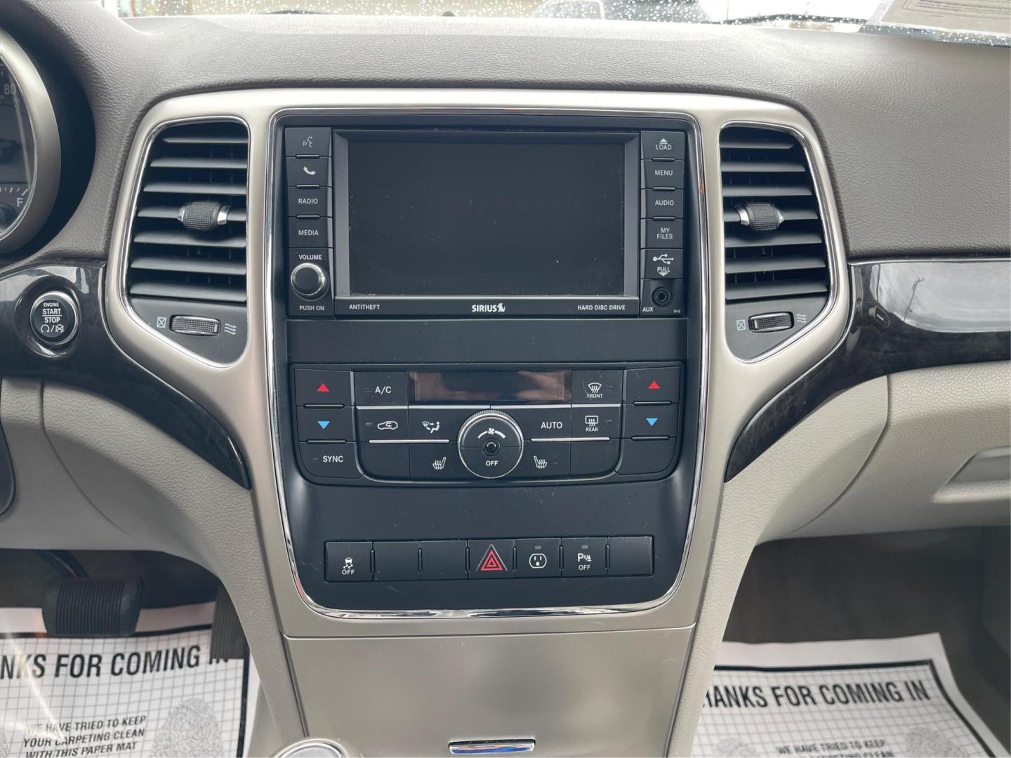 2013 Jeep Grand Cherokee Laredo (1C4RJFAG8DC) with an 3.6L V-6 DOHC engine, located at 880 E. National Road, Vandalia, OH, 45377, (937) 908-9800, 39.891918, -84.183594 - Photo#12
