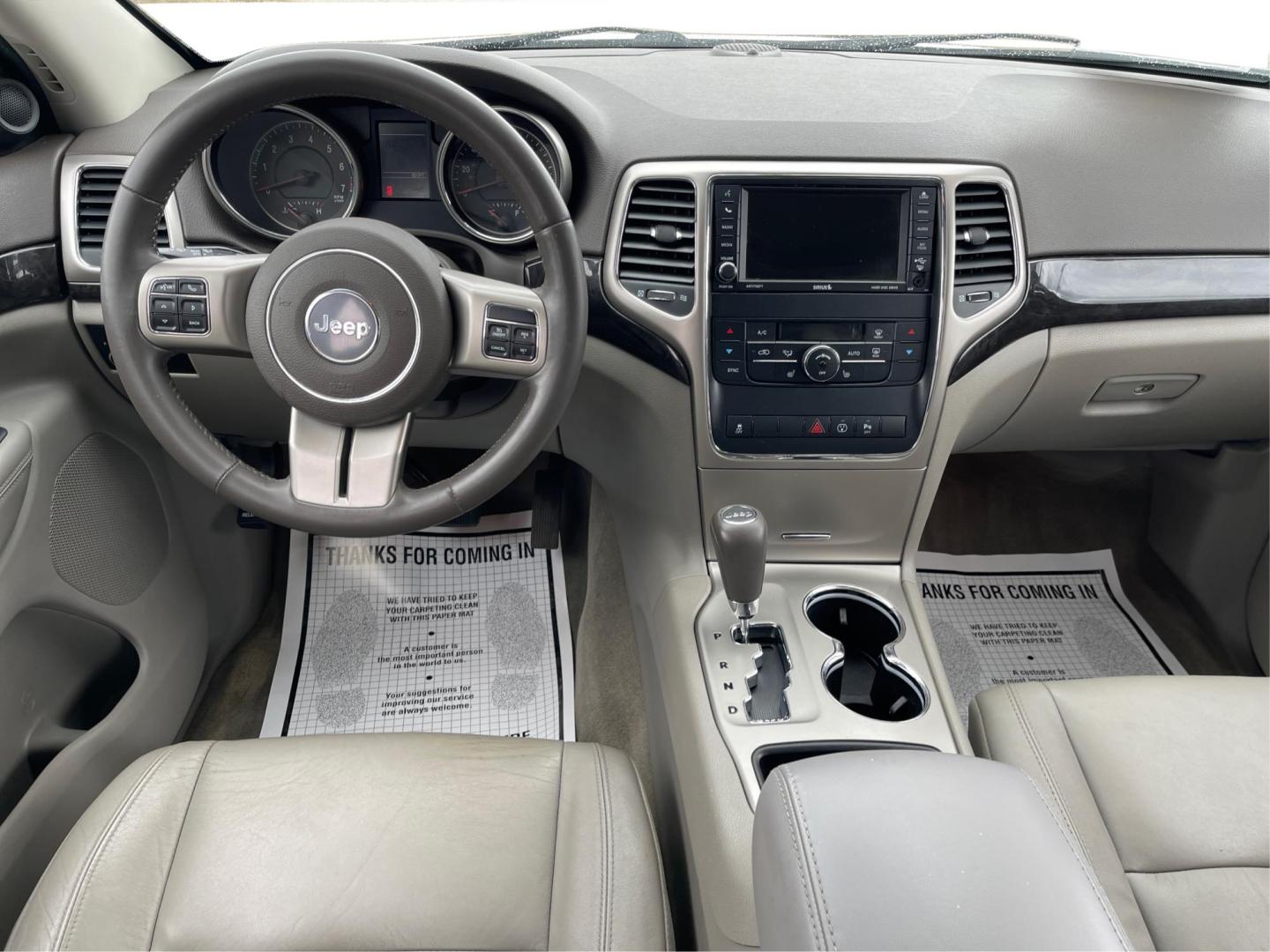 2013 Jeep Grand Cherokee Laredo (1C4RJFAG8DC) with an 3.6L V-6 DOHC engine, located at 880 E. National Road, Vandalia, OH, 45377, (937) 908-9800, 39.891918, -84.183594 - Photo#20