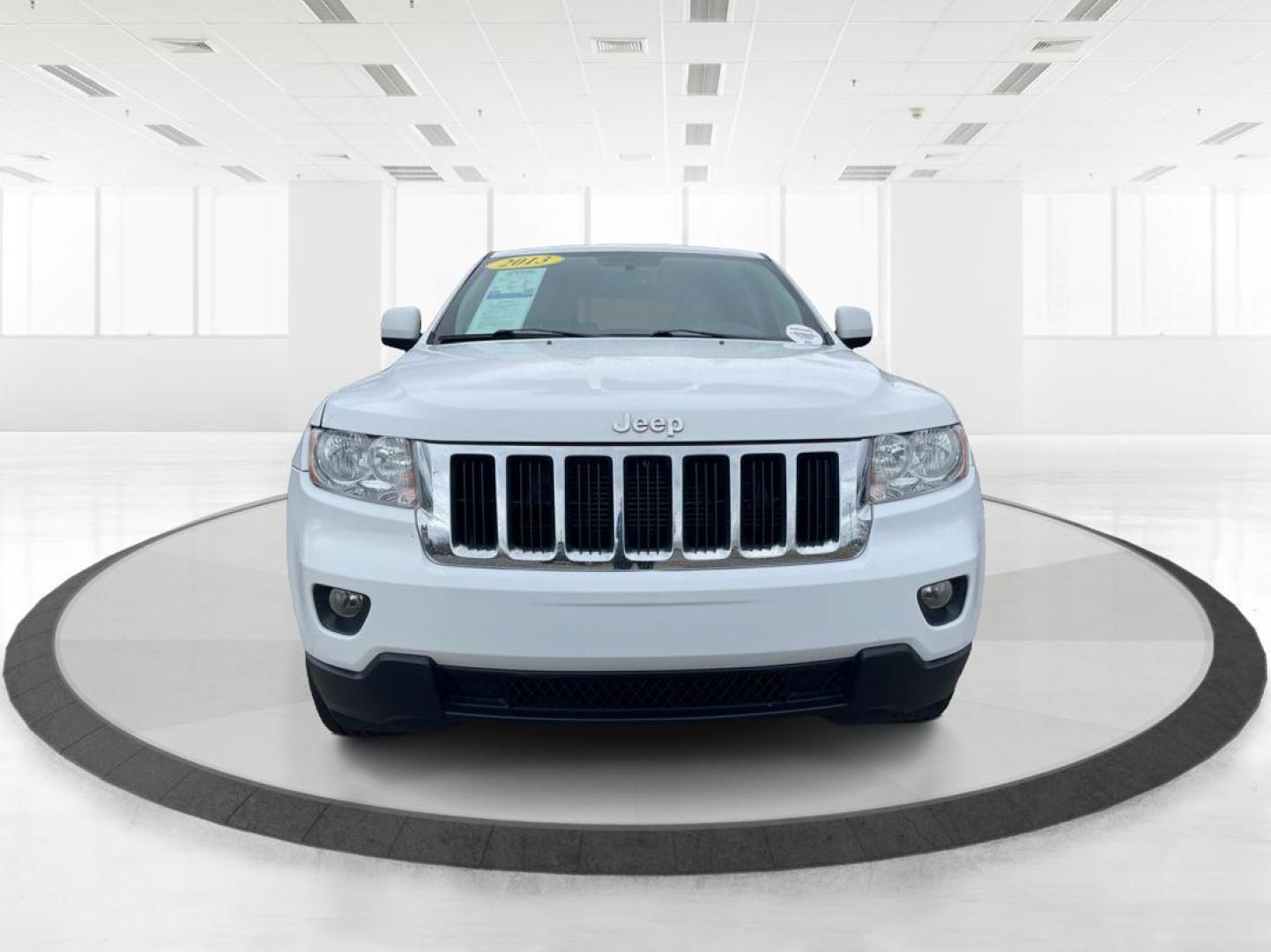 2013 Jeep Grand Cherokee Laredo (1C4RJFAG8DC) with an 3.6L V-6 DOHC engine, located at 880 E. National Road, Vandalia, OH, 45377, (937) 908-9800, 39.891918, -84.183594 - Photo#6