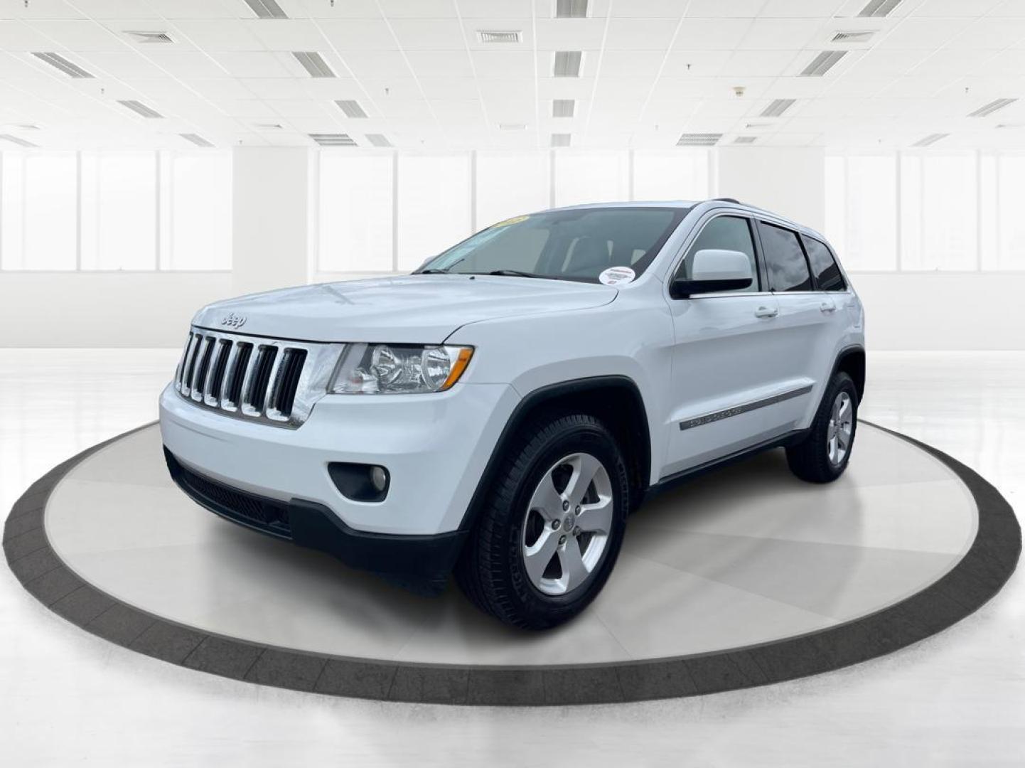 2013 Jeep Grand Cherokee Laredo (1C4RJFAG8DC) with an 3.6L V-6 DOHC engine, located at 880 E. National Road, Vandalia, OH, 45377, (937) 908-9800, 39.891918, -84.183594 - Photo#7