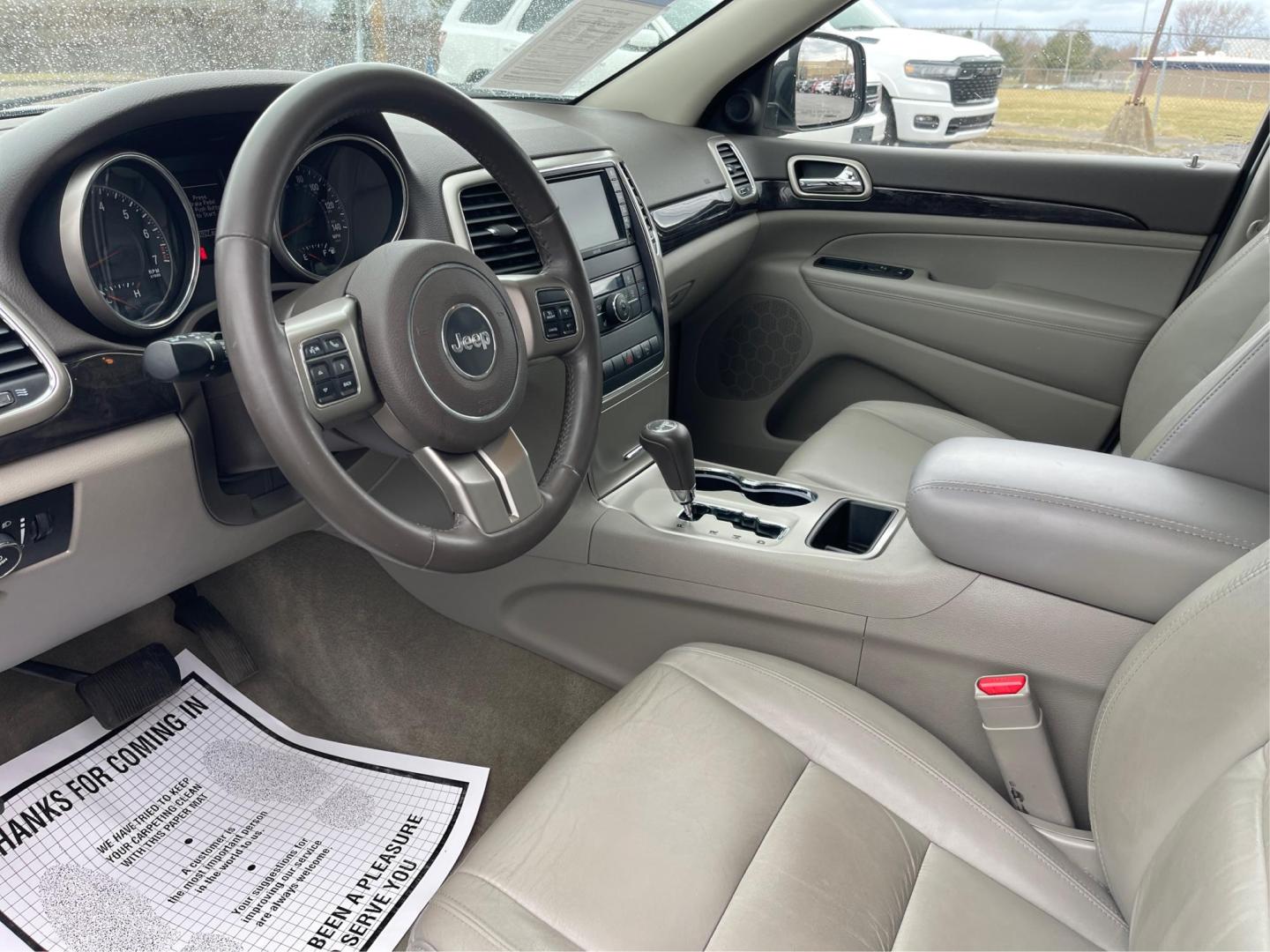 2013 Jeep Grand Cherokee Laredo (1C4RJFAG8DC) with an 3.6L V-6 DOHC engine, located at 880 E. National Road, Vandalia, OH, 45377, (937) 908-9800, 39.891918, -84.183594 - Photo#8