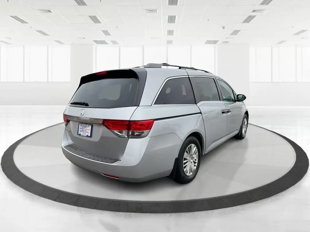2014 Honda Odyssey LX (5FNRL5H23EB) with an 3.5L V-6 i-VTEC variable valve control engine, located at 1230 East Main St, Xenia, OH, 45385, (937) 908-9800, 39.688026, -83.910172 - Photo#2