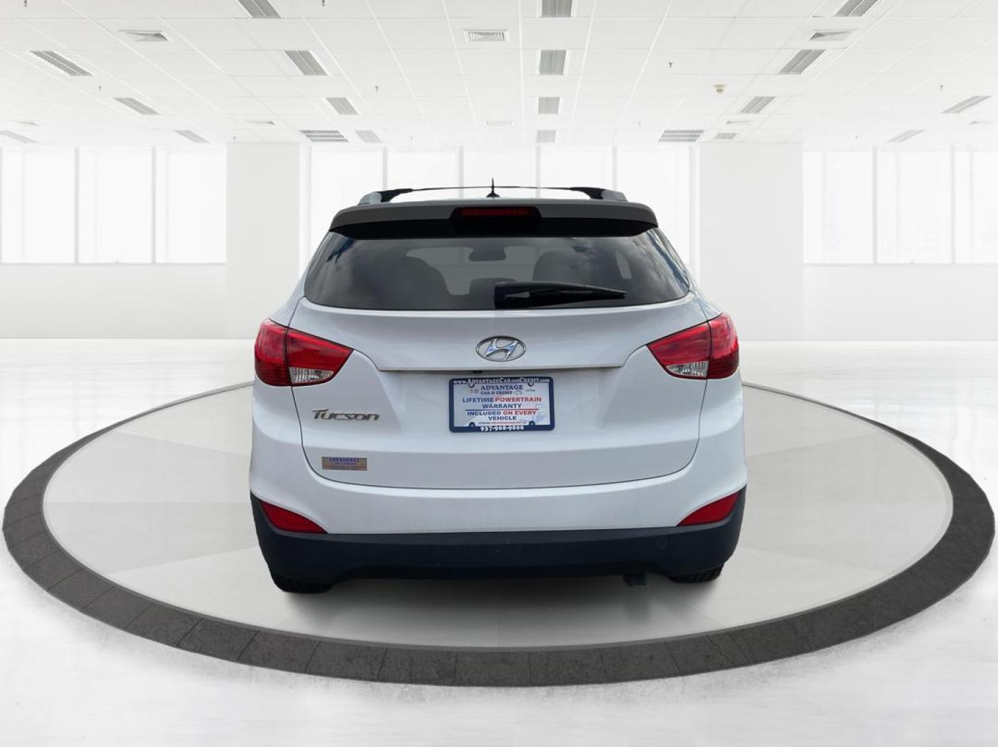 2014 Hyundai Tucson SE (KM8JU3AG0EU) with an Theta II 2.4L I-4 gasoline direct injection engine, located at 1230 East Main St, Xenia, OH, 45385, (937) 908-9800, 39.688026, -83.910172 - Photo#2