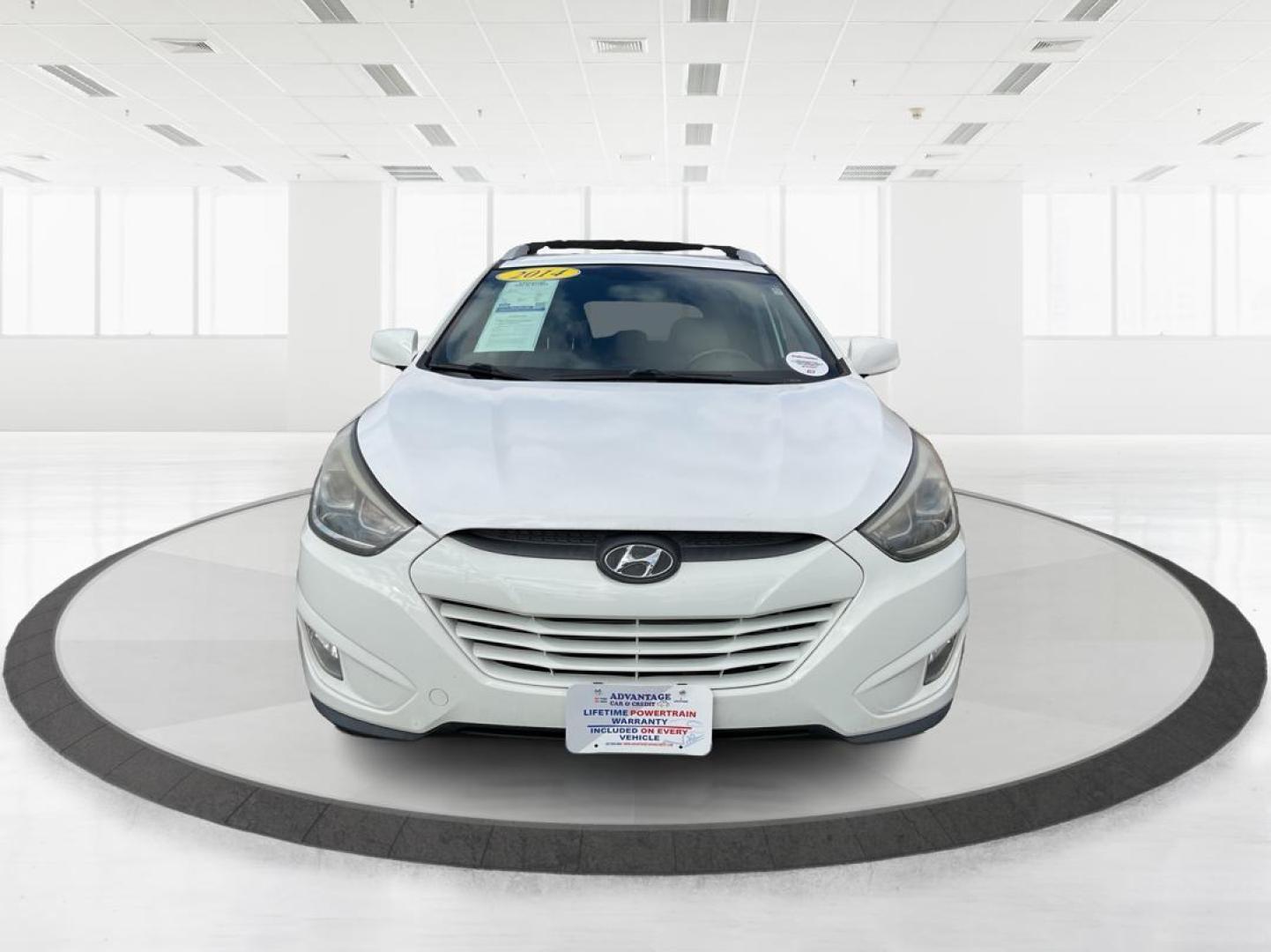 2014 Hyundai Tucson SE (KM8JU3AG0EU) with an Theta II 2.4L I-4 gasoline direct injection engine, located at 1230 East Main St, Xenia, OH, 45385, (937) 908-9800, 39.688026, -83.910172 - Photo#4
