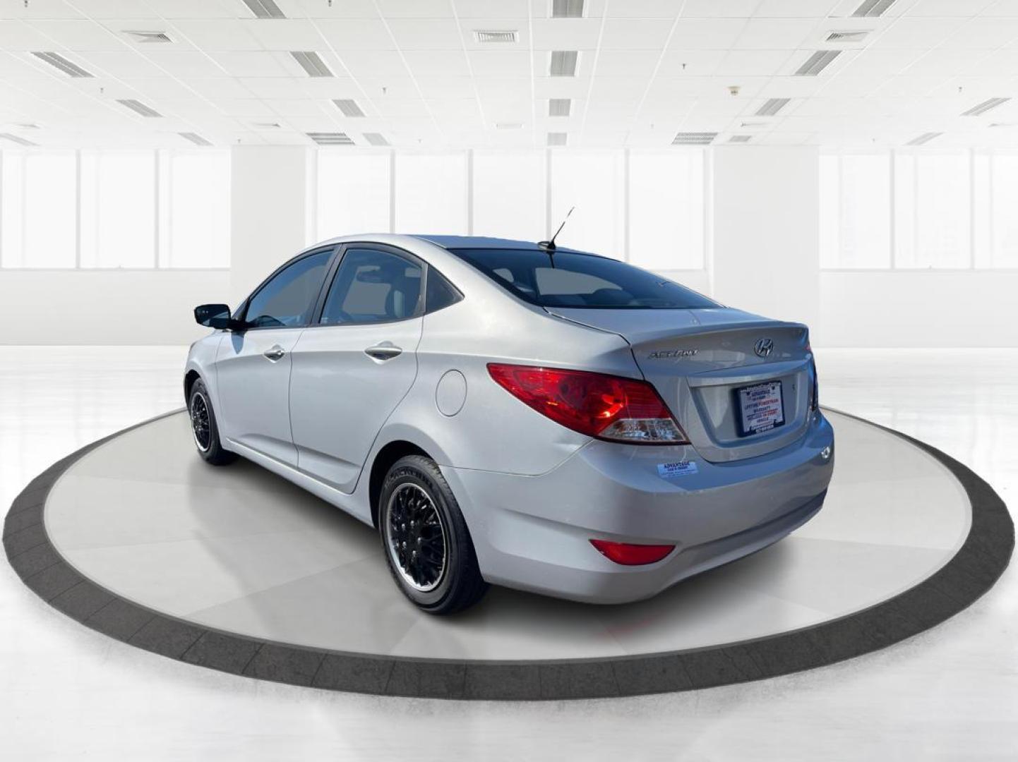 2014 Hyundai Accent GLS 4-Door (KMHCT4AE0EU) with an 1.6L L4 DOHC 16V engine, located at 8750 N County Rd 25A, Piqua, OH, 45356, (937) 908-9800, 40.164391, -84.232513 - Photo#4