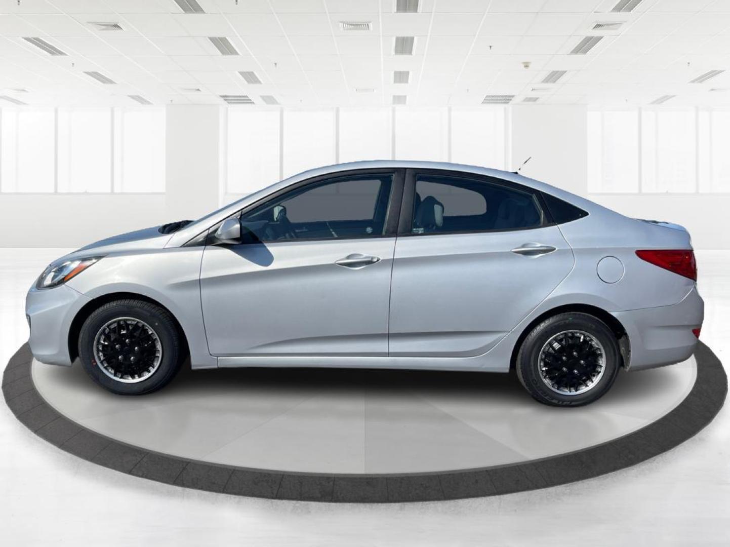 2014 Hyundai Accent GLS 4-Door (KMHCT4AE0EU) with an 1.6L L4 DOHC 16V engine, located at 8750 N County Rd 25A, Piqua, OH, 45356, (937) 908-9800, 40.164391, -84.232513 - Photo#5