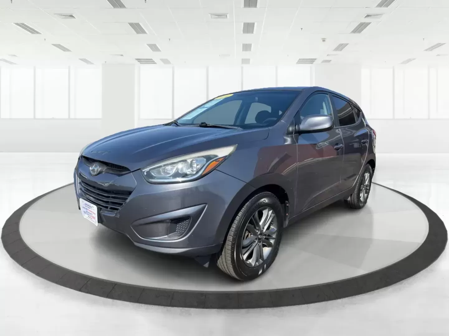 2014 Hyundai Tucson GLS (KM8JTCAF5EU) with an Nu 2L I-4 gasoline direct injection engine, located at 1230 East Main St, Xenia, OH, 45385, (937) 908-9800, 39.688026, -83.910172 - 2014 Hyundai Tucson GLS - Photo#7