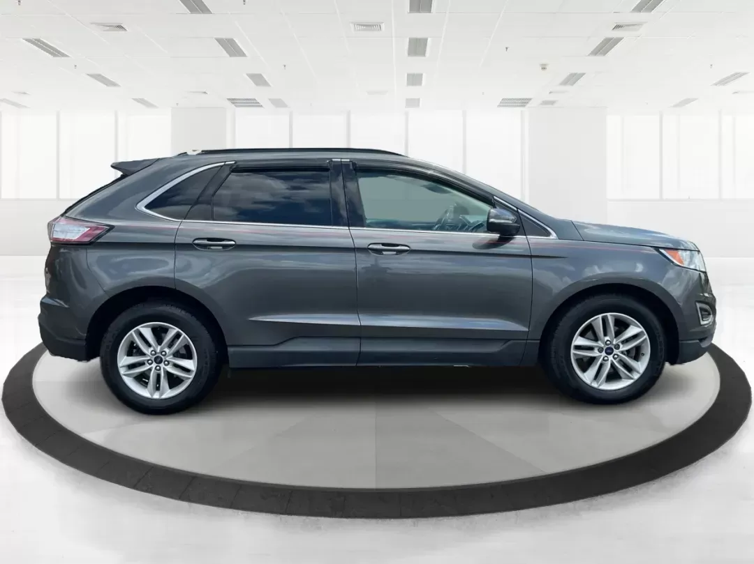 2016 Ford Edge SEL (2FMPK3J91GB) with an 3.5L V-6 DOHC engine, located at 1099 N County Rd 25A , Troy, OH, 45373, (937) 908-9800, 40.057079, -84.212883 - **Experience the Road Ahead with the 2016 Ford Edge SEL - Your Adventure Awaits!**<br /> <br /> Are you ready for your next road trip or family outing? The 2016 Ford Edge SEL is not just a car; it's a versatile SUV that caters to your lifestyle needs, making it the perfect companion for growing fami - Photo#1