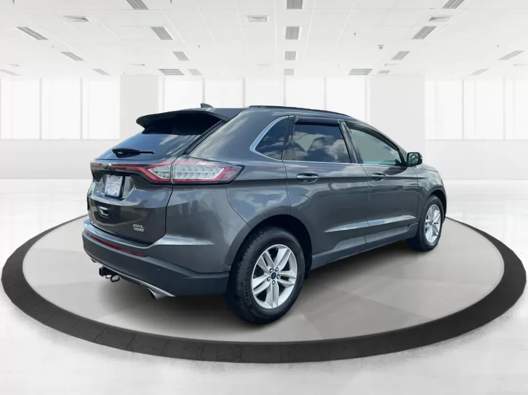 2016 Ford Edge SEL (2FMPK3J91GB) with an 3.5L V-6 DOHC engine, located at 1099 N County Rd 25A , Troy, OH, 45373, (937) 908-9800, 40.057079, -84.212883 - **Experience the Road Ahead with the 2016 Ford Edge SEL - Your Adventure Awaits!**<br /> <br /> Are you ready for your next road trip or family outing? The 2016 Ford Edge SEL is not just a car; it's a versatile SUV that caters to your lifestyle needs, making it the perfect companion for growing fami - Photo#2