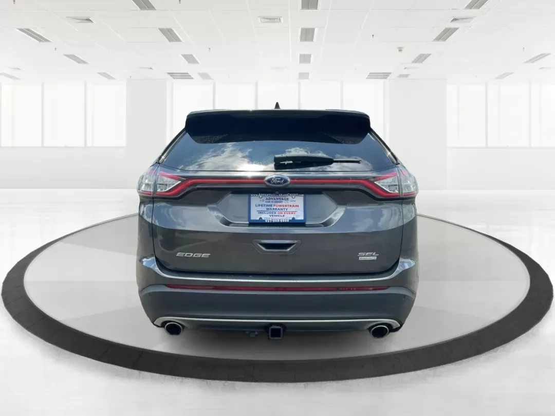 2016 Ford Edge SEL (2FMPK3J91GB) with an 3.5L V-6 DOHC engine, located at 1099 N County Rd 25A , Troy, OH, 45373, (937) 908-9800, 40.057079, -84.212883 - **Experience the Road Ahead with the 2016 Ford Edge SEL - Your Adventure Awaits!**<br /> <br /> Are you ready for your next road trip or family outing? The 2016 Ford Edge SEL is not just a car; it's a versatile SUV that caters to your lifestyle needs, making it the perfect companion for growing fami - Photo#3