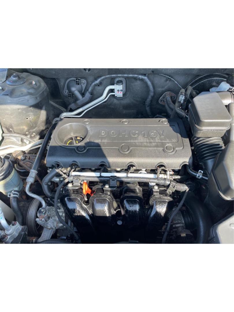 2012 Hyundai Santa Fe GLS (5XYZG3ABXCG) with an 2.4L I-4 DOHC engine, located at 401 Woodman Dr, Riverside, OH, 45431, (937) 908-9800, 39.760899, -84.123421 - 2012 Hyundai Santa Fe GLS - Photo#10