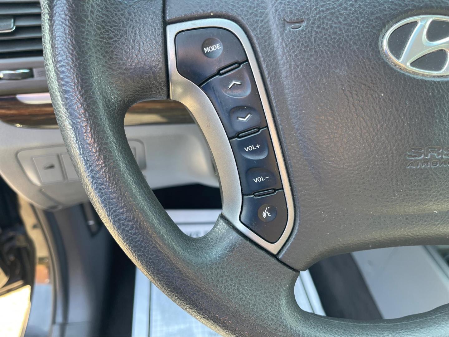 2012 Hyundai Santa Fe GLS (5XYZG3ABXCG) with an 2.4L I-4 DOHC engine, located at 401 Woodman Dr, Riverside, OH, 45431, (937) 908-9800, 39.760899, -84.123421 - 2012 Hyundai Santa Fe GLS - Photo#15