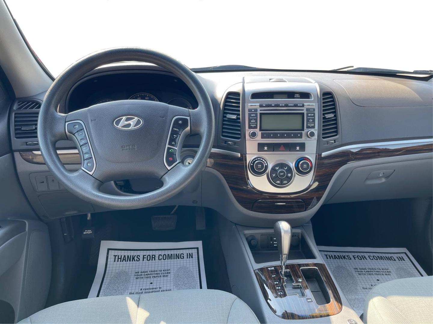 2012 Hyundai Santa Fe GLS (5XYZG3ABXCG) with an 2.4L I-4 DOHC engine, located at 401 Woodman Dr, Riverside, OH, 45431, (937) 908-9800, 39.760899, -84.123421 - 2012 Hyundai Santa Fe GLS - Photo#20