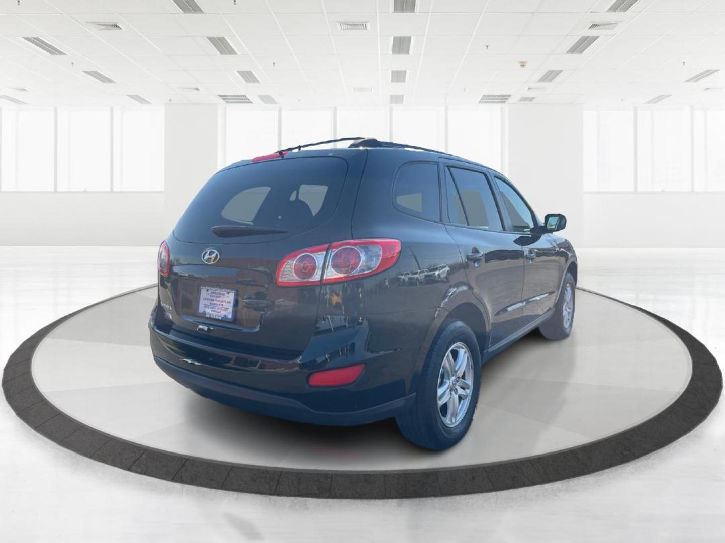 2012 Hyundai Santa Fe GLS (5XYZG3ABXCG) with an 2.4L I-4 DOHC engine, located at 401 Woodman Dr, Riverside, OH, 45431, (937) 908-9800, 39.760899, -84.123421 - 2012 Hyundai Santa Fe GLS - Photo#2