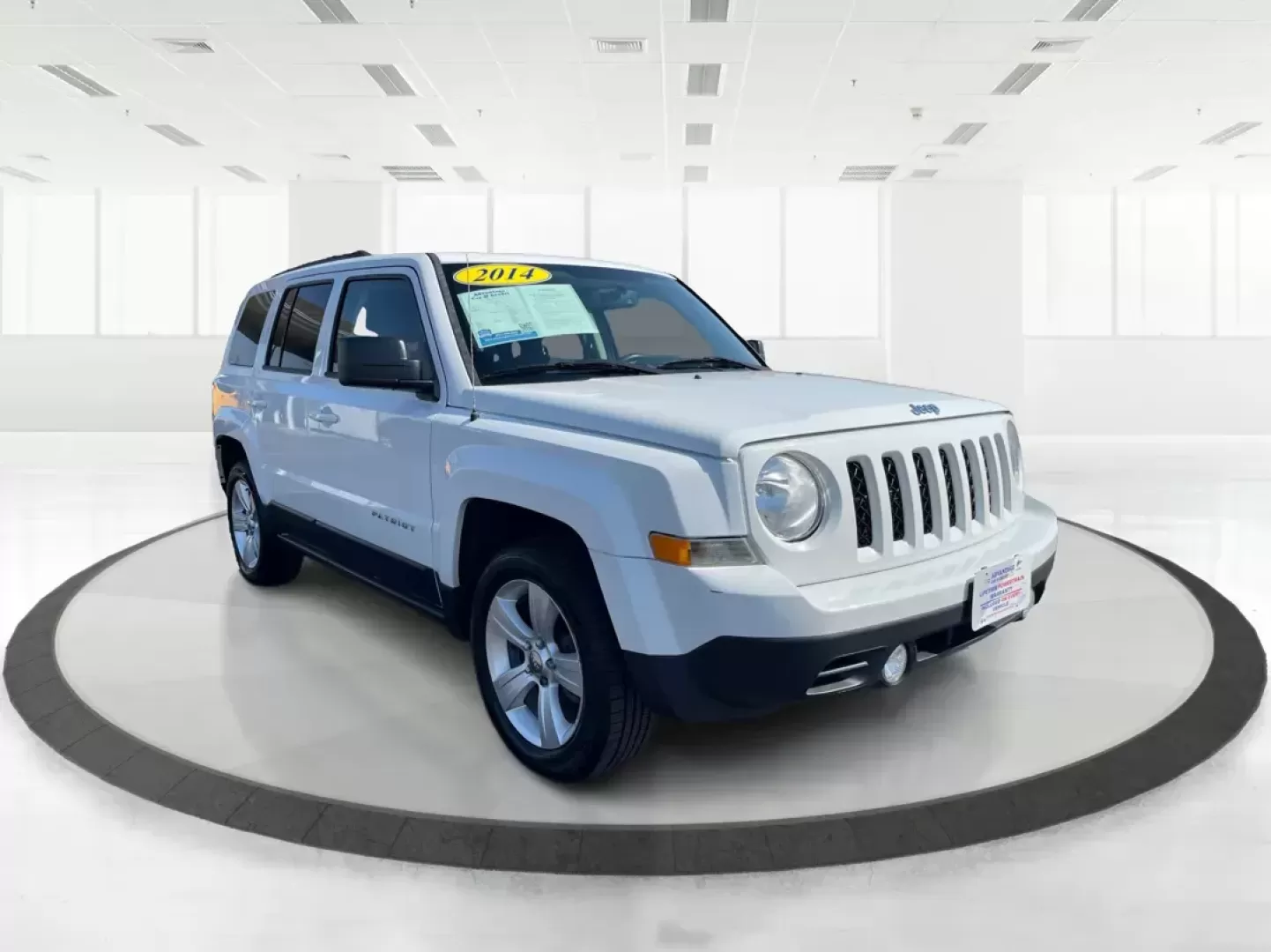 2014 Jeep Patriot Latitude (1C4NJPFB0ED) with an 2.4L I-4 DOHC engine, located at 1099 N County Rd 25A, Troy, OH, 45373, (937) 908-9800, 40.057079, -84.212883 - Photo#0