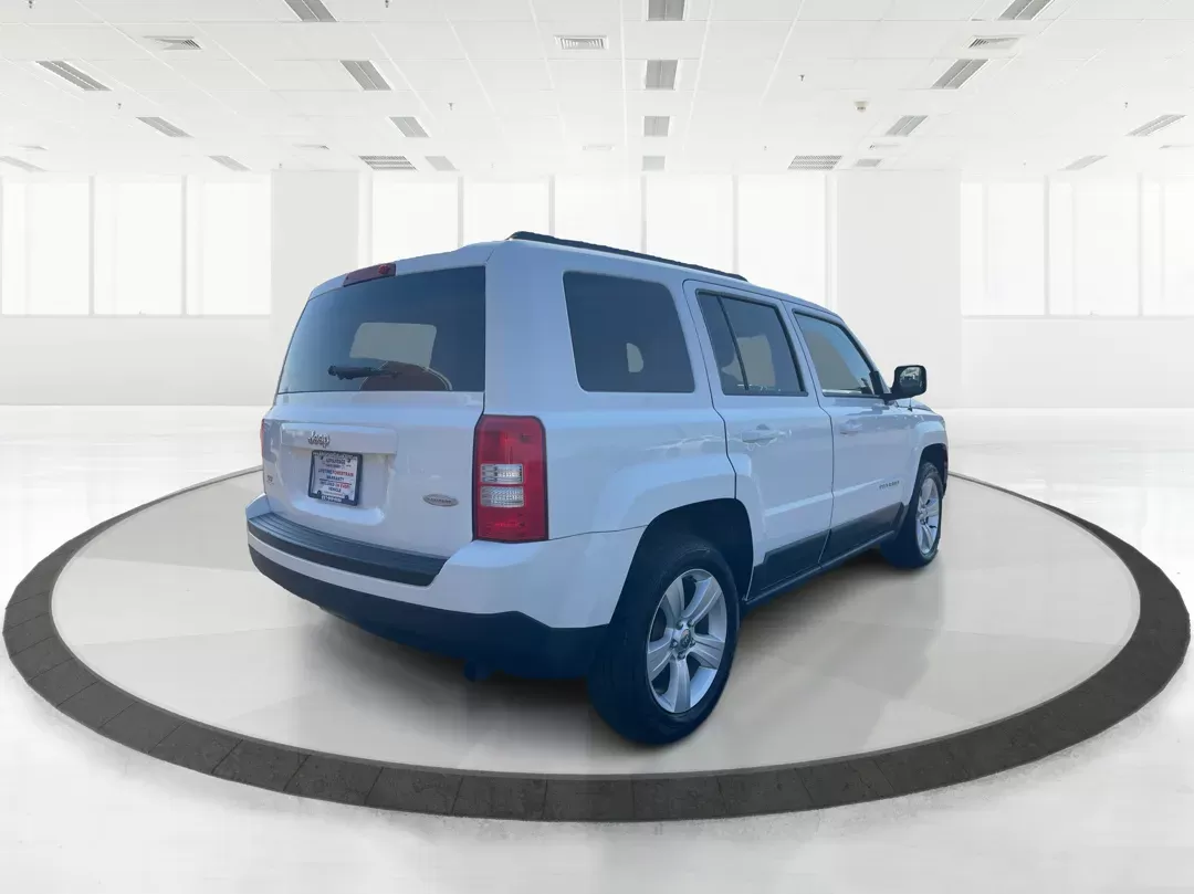 2014 Jeep Patriot Latitude (1C4NJPFB0ED) with an 2.4L I-4 DOHC engine, located at 1951 S Dayton Lakeview Rd., New Carlisle, OH, 45344, (937) 908-9800, 39.890999, -84.050255 - 2014 Jeep Patriot Latitude - Photo#2