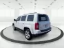 2014 Jeep Patriot Latitude (1C4NJPFB0ED) with an 2.4L I-4 DOHC engine, located at 1099 N County Rd 25A, Troy, OH, 45373, (937) 908-9800, 40.057079, -84.212883 - Photo#5
