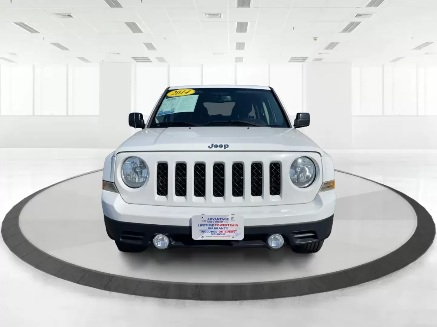 2014 Jeep Patriot Latitude (1C4NJPFB0ED) with an 2.4L I-4 DOHC engine, located at 1099 N County Rd 25A, Troy, OH, 45373, (937) 908-9800, 40.057079, -84.212883 - Photo#7