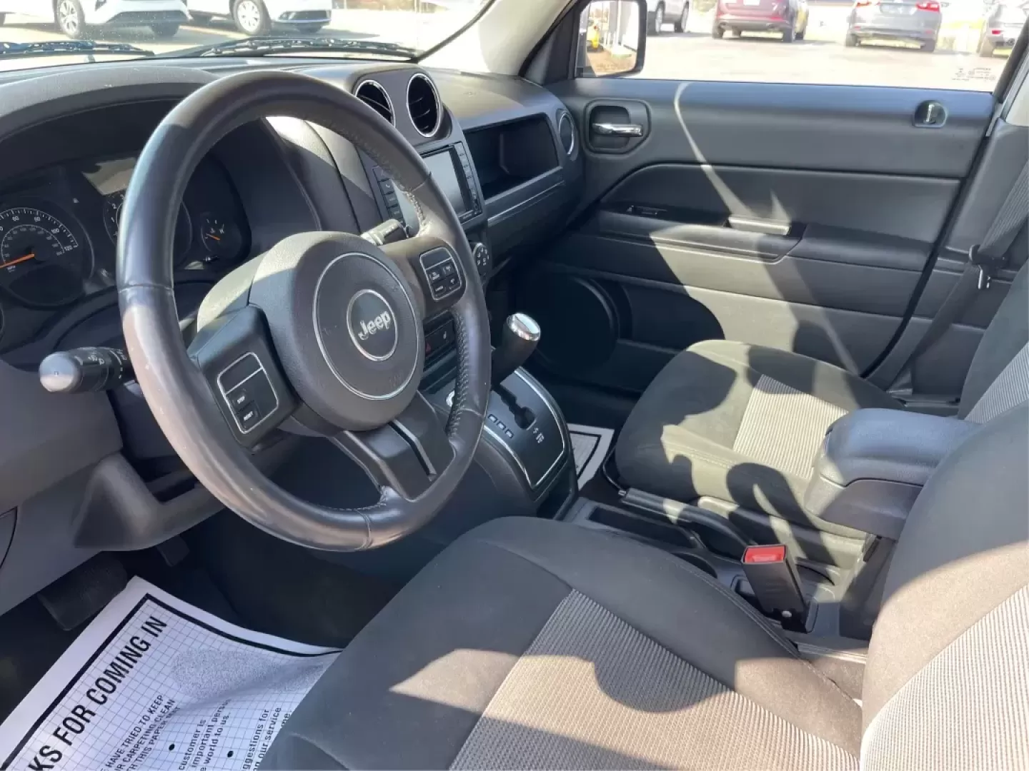 2014 Jeep Patriot Latitude (1C4NJPFB0ED) with an 2.4L I-4 DOHC engine, located at 1099 N County Rd 25A, Troy, OH, 45373, (937) 908-9800, 40.057079, -84.212883 - Photo#9