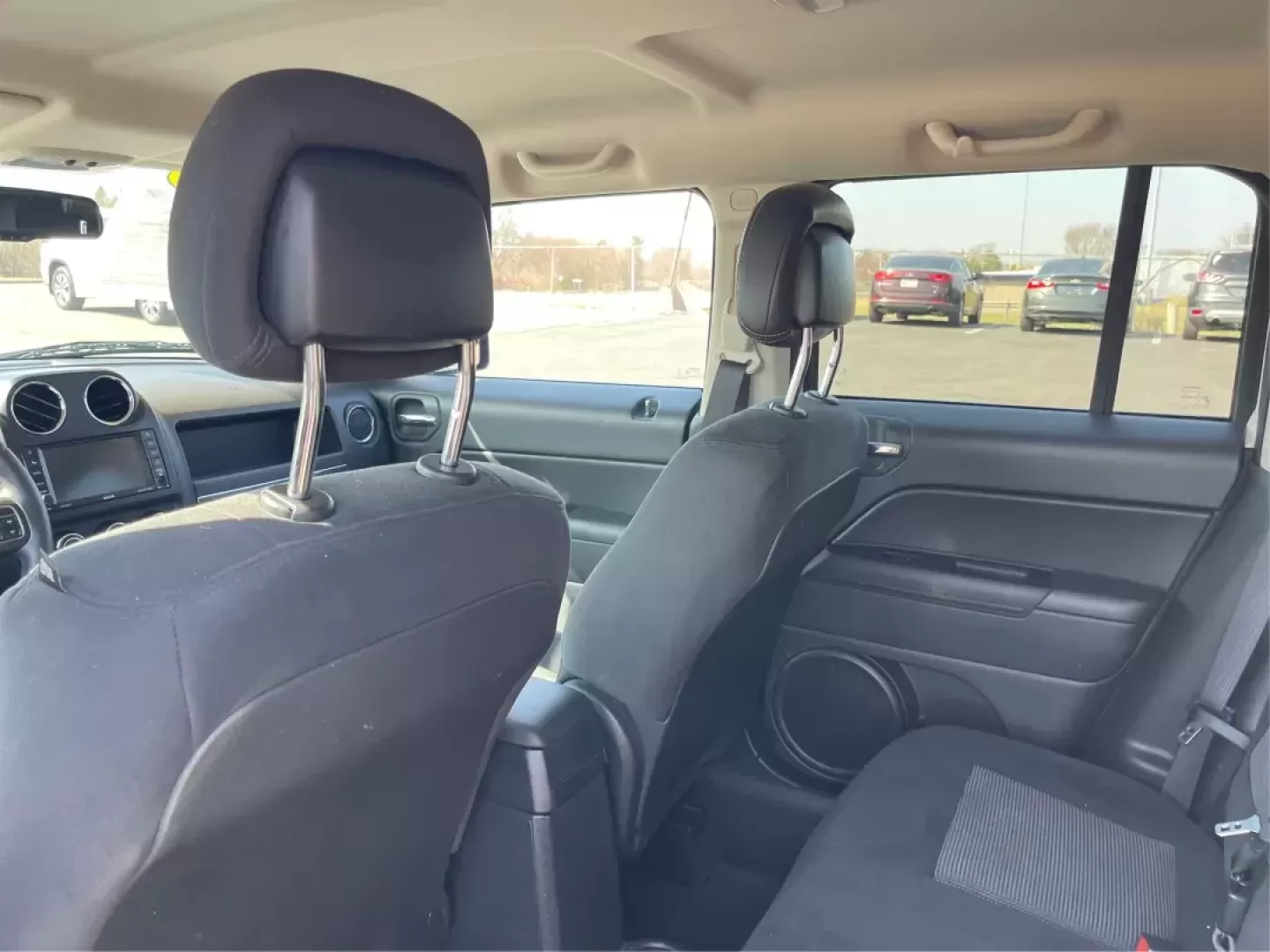 2014 Jeep Patriot Latitude (1C4NJPFB0ED) with an 2.4L I-4 DOHC engine, located at 1099 N County Rd 25A, Troy, OH, 45373, (937) 908-9800, 40.057079, -84.212883 - Photo#10