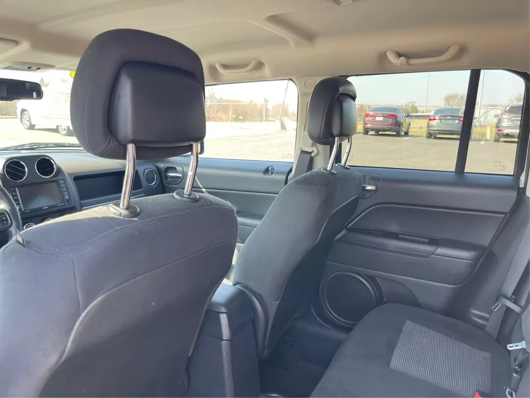 2014 Jeep Patriot Latitude (1C4NJPFB0ED) with an 2.4L I-4 DOHC engine, located at 1951 S Dayton Lakeview Rd., New Carlisle, OH, 45344, (937) 908-9800, 39.890999, -84.050255 - 2014 Jeep Patriot Latitude - Photo#9