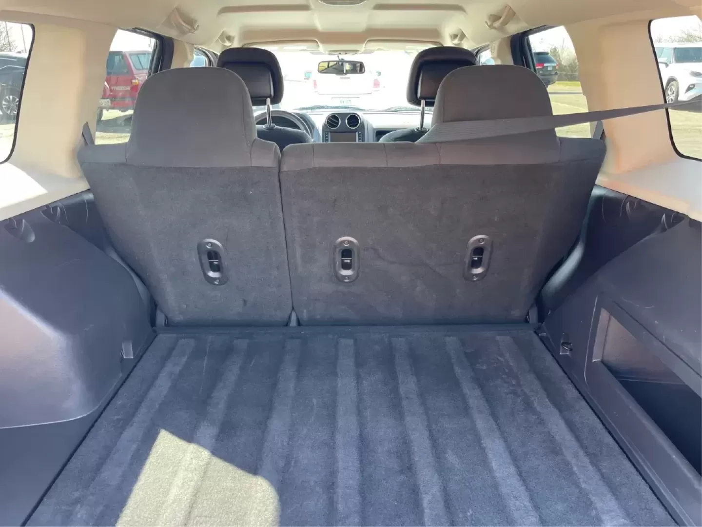 2014 Jeep Patriot Latitude (1C4NJPFB0ED) with an 2.4L I-4 DOHC engine, located at 1099 N County Rd 25A, Troy, OH, 45373, (937) 908-9800, 40.057079, -84.212883 - Photo#12