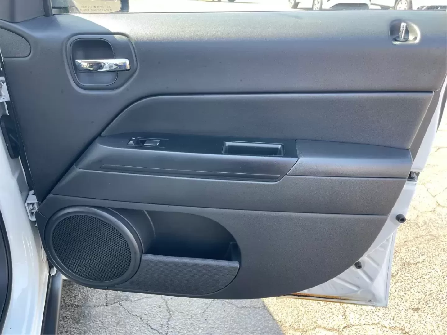 2014 Jeep Patriot Latitude (1C4NJPFB0ED) with an 2.4L I-4 DOHC engine, located at 1099 N County Rd 25A, Troy, OH, 45373, (937) 908-9800, 40.057079, -84.212883 - Photo#19