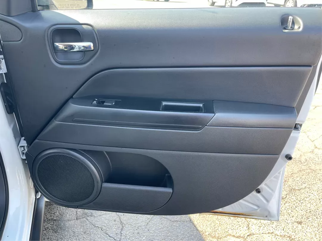 2014 Jeep Patriot Latitude (1C4NJPFB0ED) with an 2.4L I-4 DOHC engine, located at 1951 S Dayton Lakeview Rd., New Carlisle, OH, 45344, (937) 908-9800, 39.890999, -84.050255 - 2014 Jeep Patriot Latitude - Photo#18