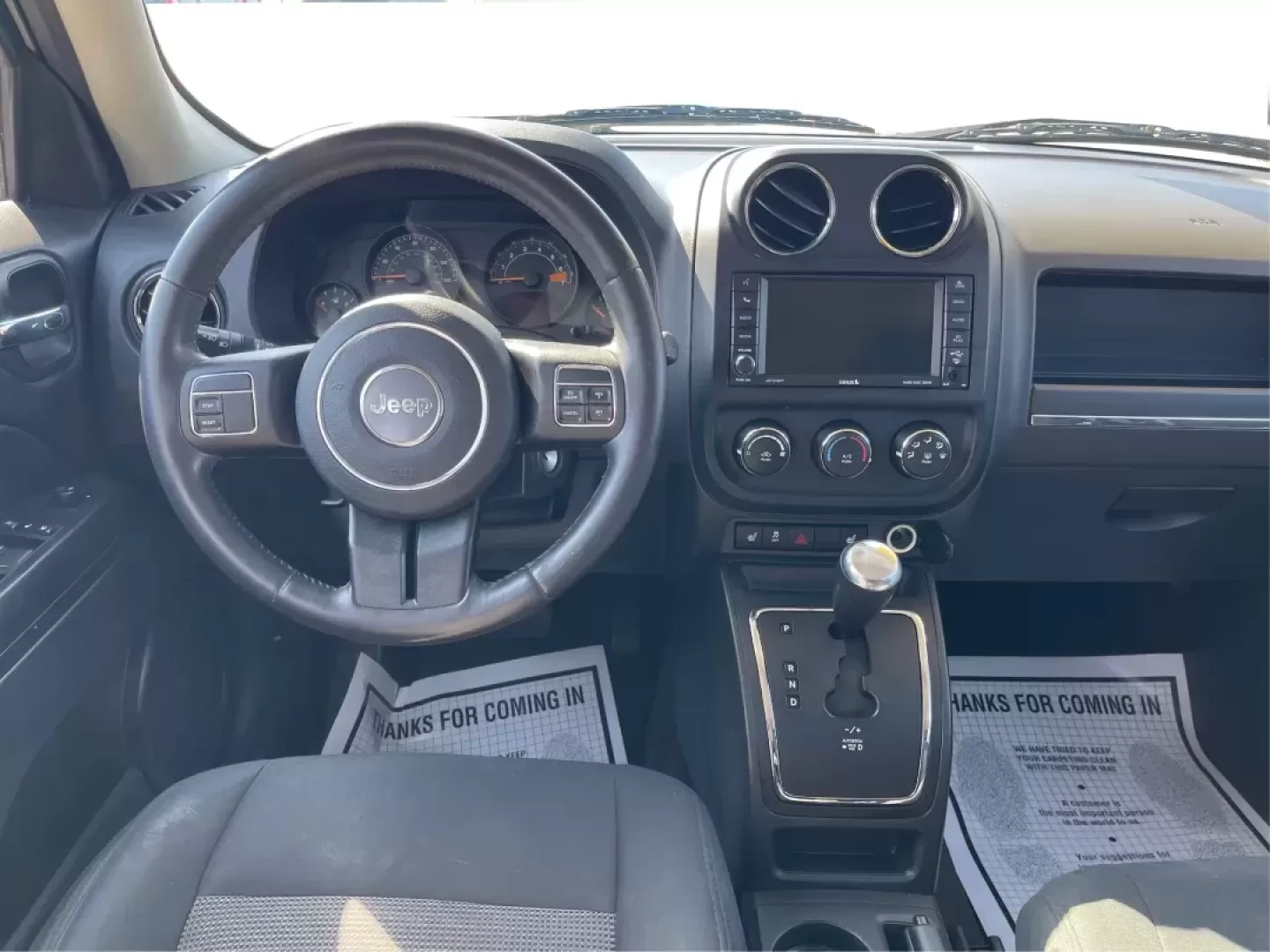 2014 Jeep Patriot Latitude (1C4NJPFB0ED) with an 2.4L I-4 DOHC engine, located at 1099 N County Rd 25A, Troy, OH, 45373, (937) 908-9800, 40.057079, -84.212883 - Photo#20