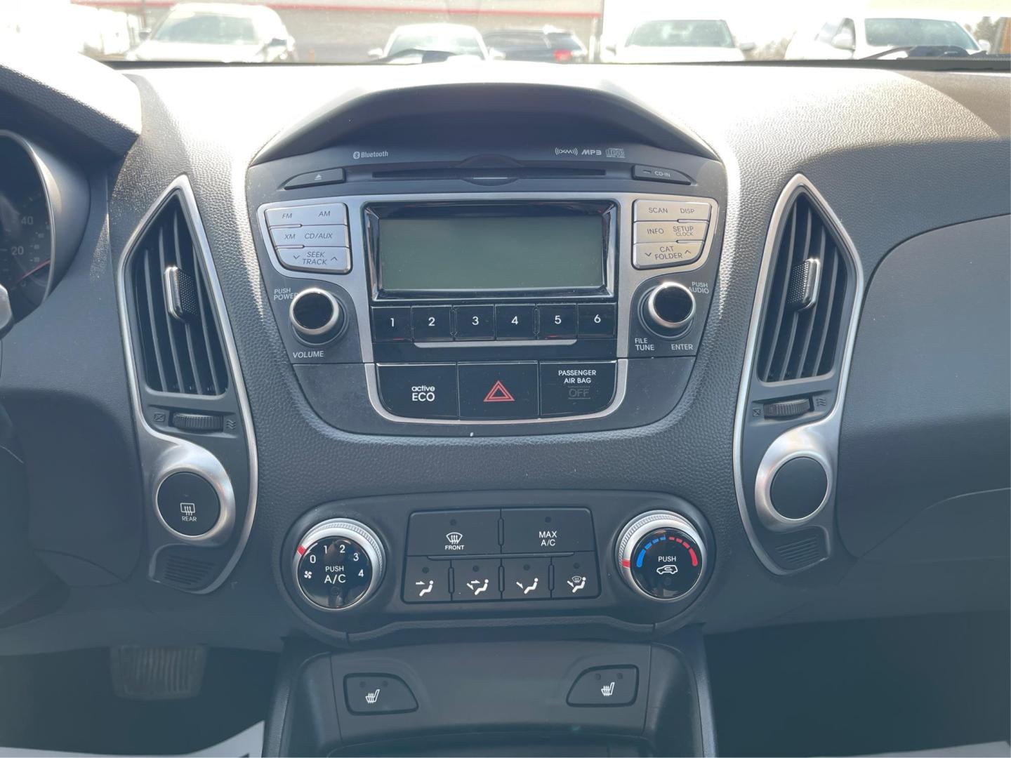2013 Hyundai Tucson GLS (KM8JU3AC1DU) with an Theta II 2.4L I-4 DOHC engine, located at 1099 N County Rd 25A, Troy, OH, 45373, (937) 908-9800, 40.057079, -84.212883 - Photo#12