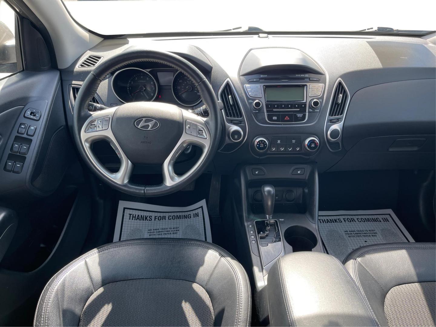 2013 Hyundai Tucson GLS (KM8JU3AC1DU) with an Theta II 2.4L I-4 DOHC engine, located at 1099 N County Rd 25A, Troy, OH, 45373, (937) 908-9800, 40.057079, -84.212883 - Photo#20