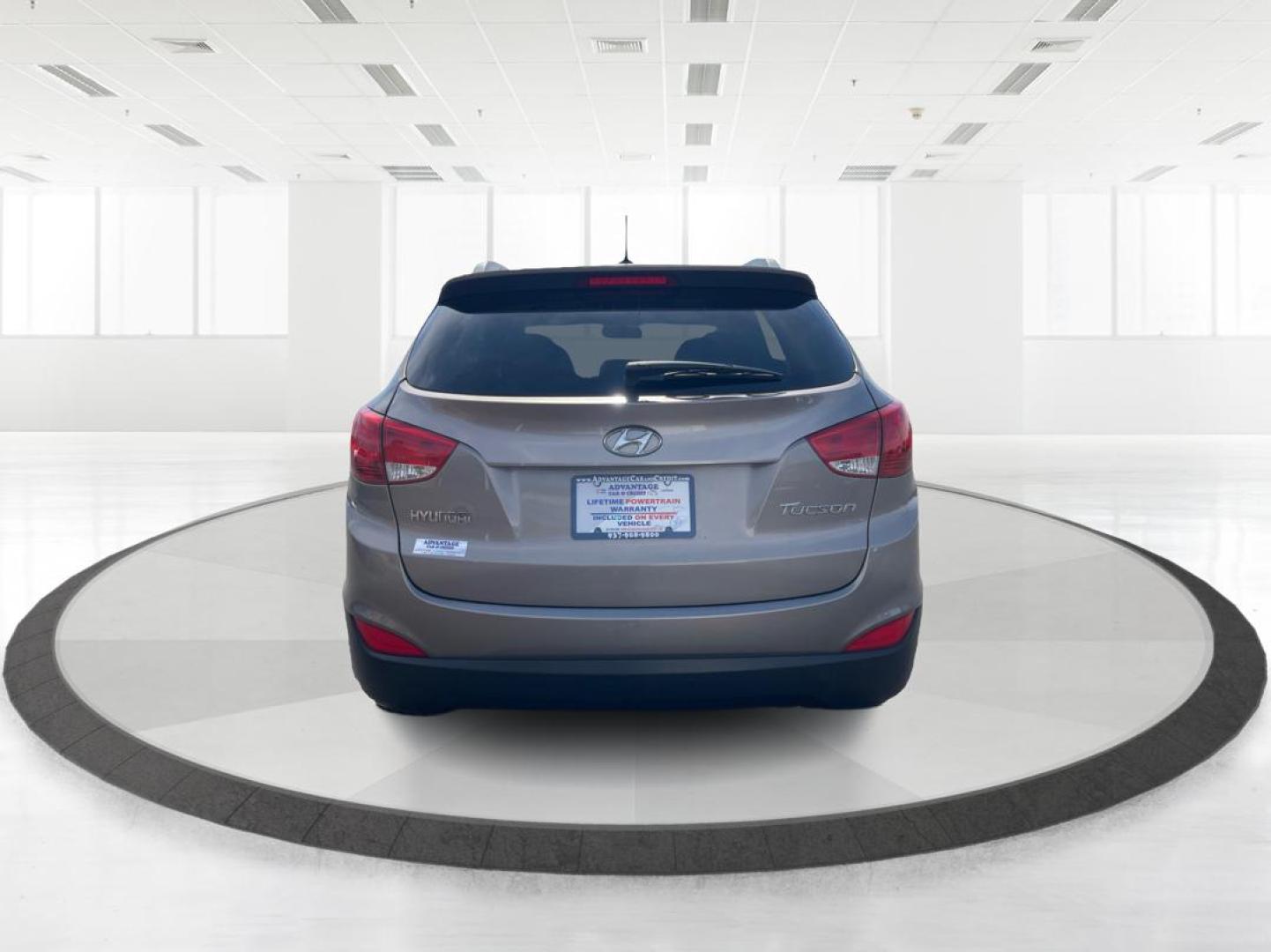 2013 Hyundai Tucson GLS (KM8JU3AC1DU) with an Theta II 2.4L I-4 DOHC engine, located at 1099 N County Rd 25A, Troy, OH, 45373, (937) 908-9800, 40.057079, -84.212883 - Photo#3
