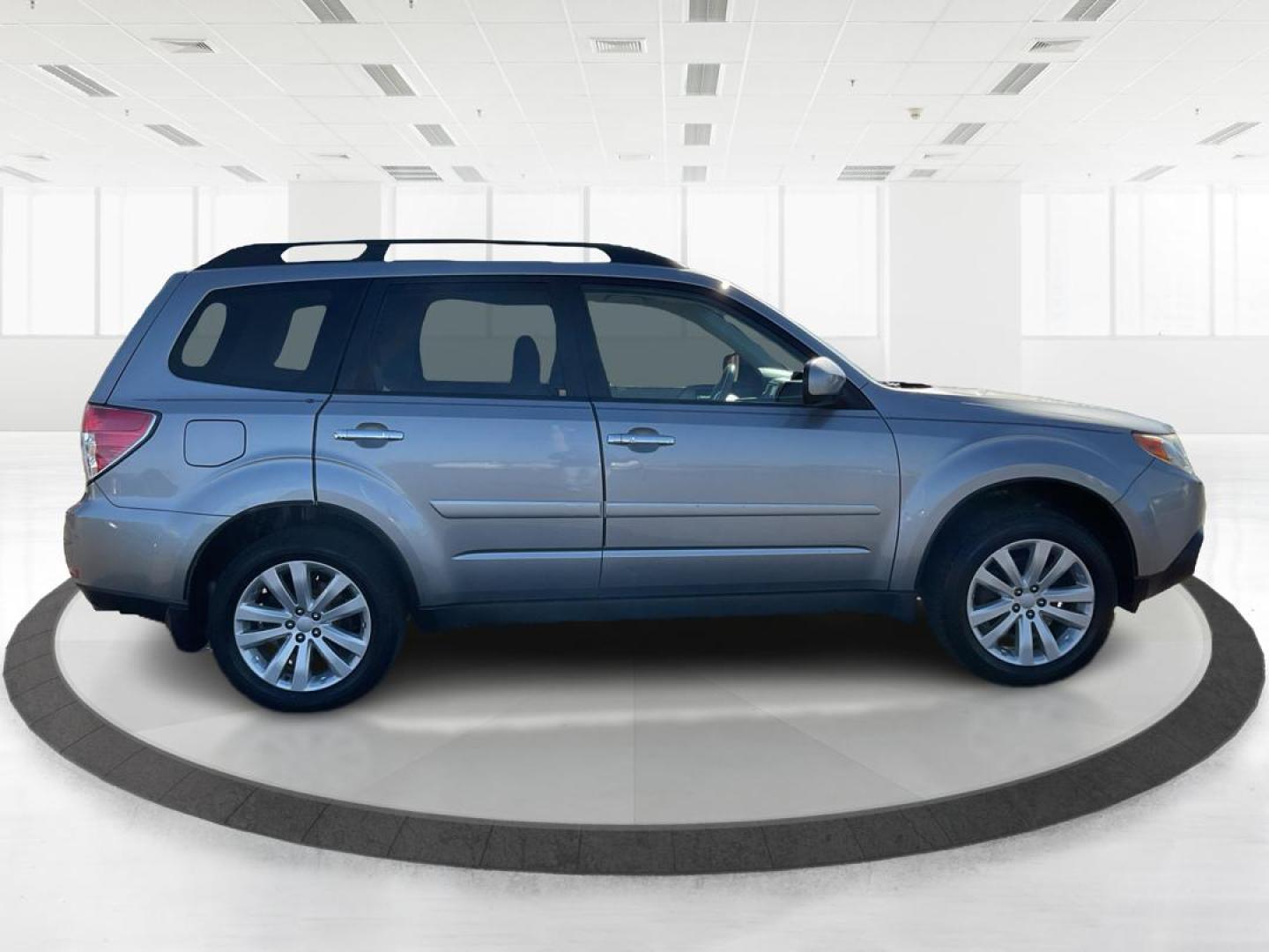 2011 Subaru Forester 2.5X Limited (JF2SHAFC9BH) with an 2.5L H-4 DOHC engine, located at 1951 S Dayton Lakeview Rd., New Carlisle, OH, 45344, (937) 908-9800, 39.890999, -84.050255 - Photo#1