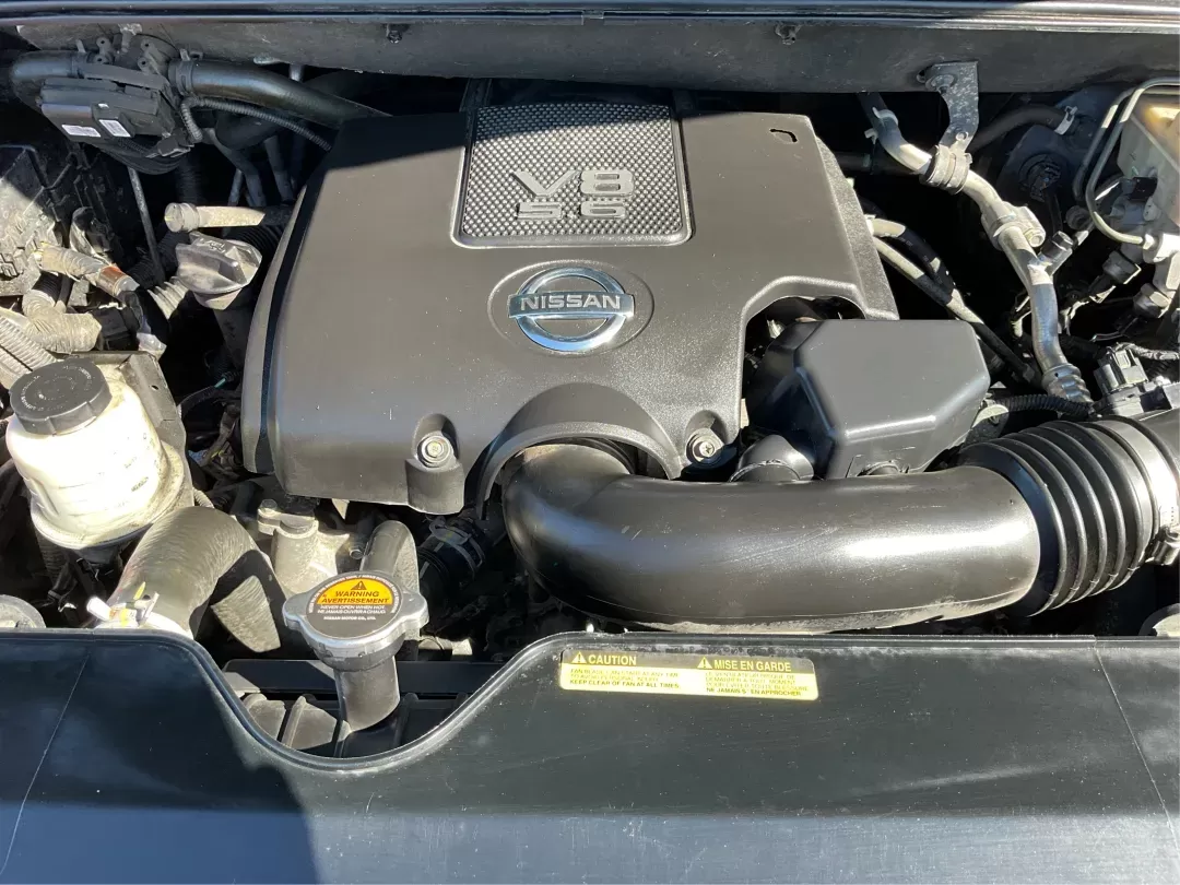 2015 Nissan Armada Platinum (5N1BA0NE1FN) with an Endurance 5.6L V-8 DOHC engine, located at 1230 East Main St, Xenia, OH, 45385, (937) 908-9800, 39.688026, -83.910172 - Third Row - Photo#10