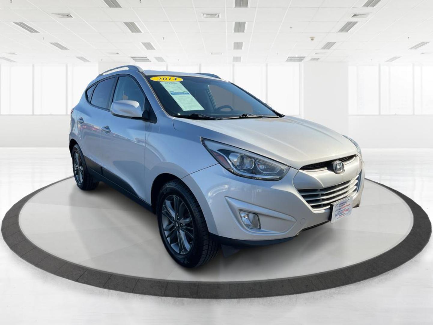 2014 Hyundai Tucson SE (KM8JUCAG8EU) with an Theta II 2.4L I-4 gasoline direct injection engine, located at 1230 East Main St, Xenia, OH, 45385, (937) 908-9800, 39.688026, -83.910172 - Photo#0