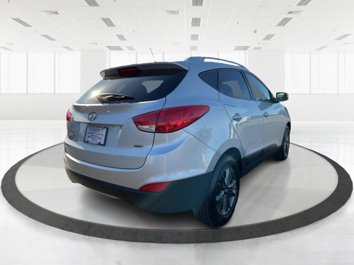 2014 Hyundai Tucson SE (KM8JUCAG8EU) with an Theta II 2.4L I-4 gasoline direct injection engine, located at 1230 East Main St, Xenia, OH, 45385, (937) 908-9800, 39.688026, -83.910172 - Photo#2