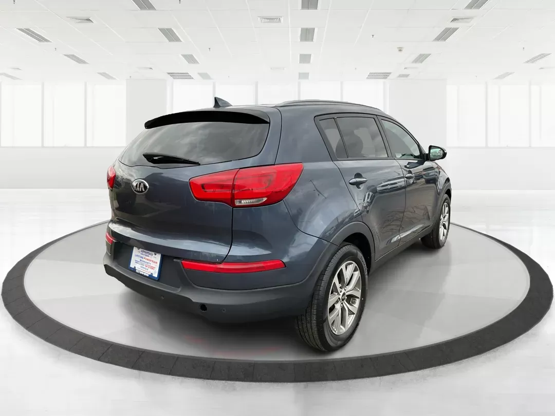 2014 Kia Sportage LX (KNDPBCAC3E7) with an 2.4L I-4 gasoline direct injection engine, located at 880 E. National Road, Vandalia, OH, 45377, (937) 908-9800, 39.891918, -84.183594 - Photo#2