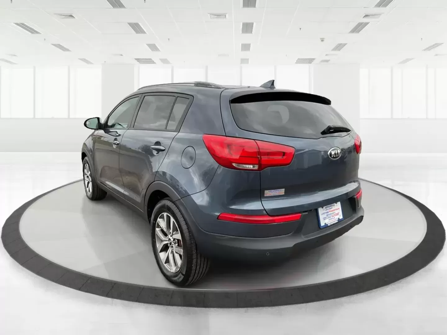 2014 Kia Sportage LX (KNDPBCAC3E7) with an 2.4L I-4 gasoline direct injection engine, located at 880 E. National Road, Vandalia, OH, 45377, (937) 908-9800, 39.891918, -84.183594 - Photo#4