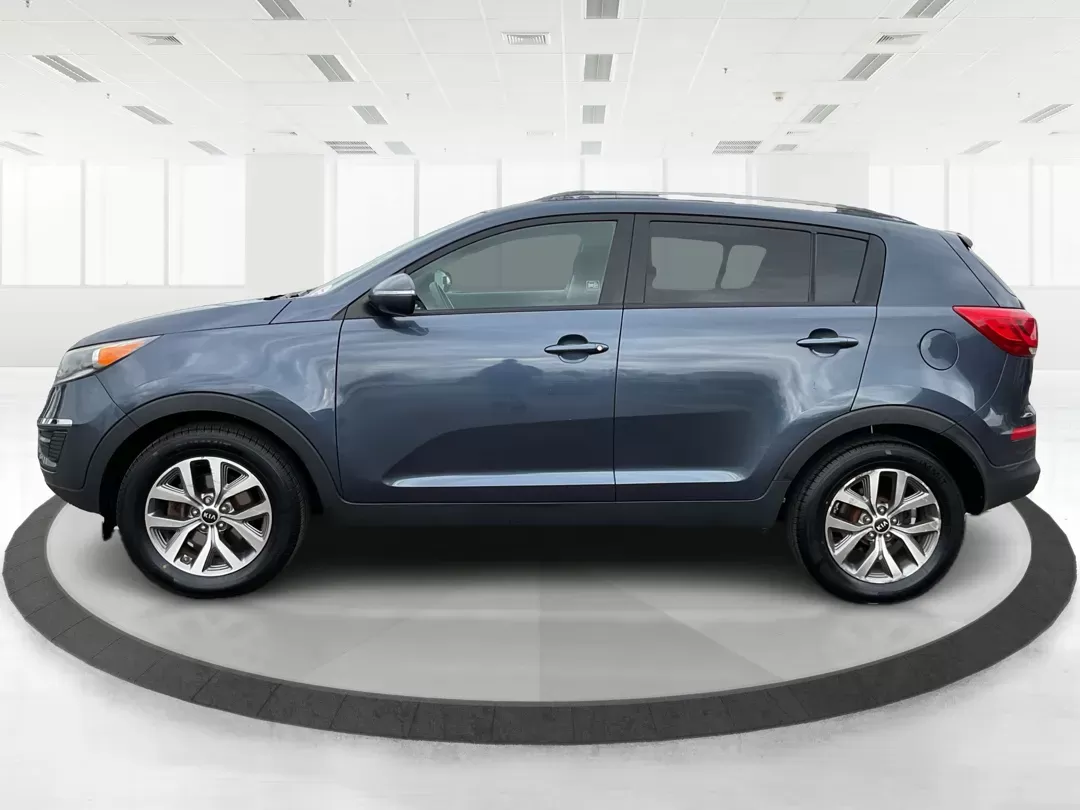 2014 Kia Sportage LX (KNDPBCAC3E7) with an 2.4L I-4 gasoline direct injection engine, located at 880 E. National Road, Vandalia, OH, 45377, (937) 908-9800, 39.891918, -84.183594 - Photo#5