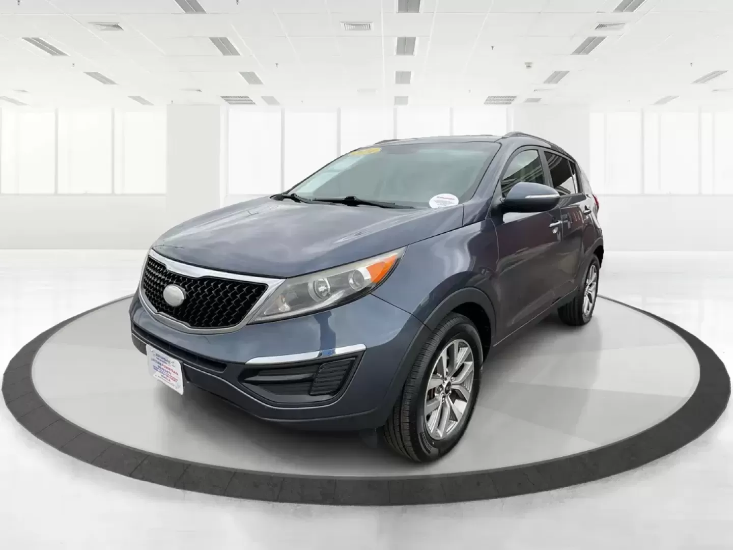 2014 Kia Sportage LX (KNDPBCAC3E7) with an 2.4L I-4 gasoline direct injection engine, located at 880 E. National Road, Vandalia, OH, 45377, (937) 908-9800, 39.891918, -84.183594 - Photo#7