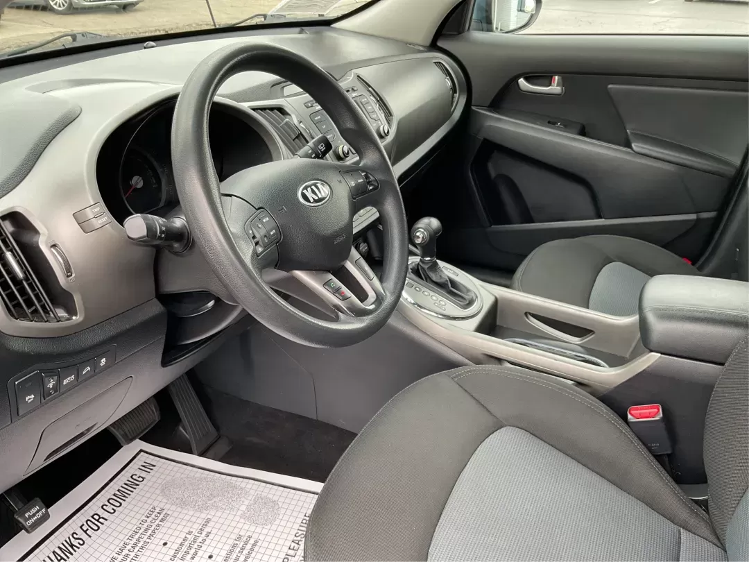 2014 Kia Sportage LX (KNDPBCAC3E7) with an 2.4L I-4 gasoline direct injection engine, located at 880 E. National Road, Vandalia, OH, 45377, (937) 908-9800, 39.891918, -84.183594 - Photo#8