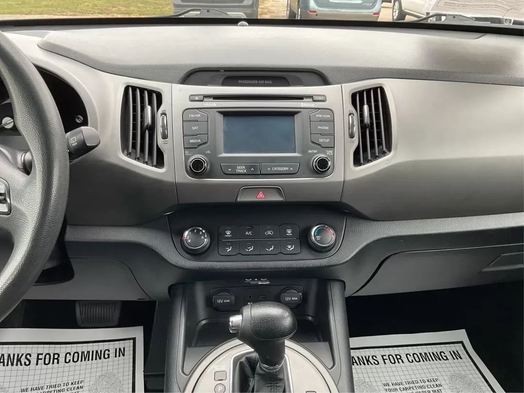 2014 Kia Sportage LX (KNDPBCAC3E7) with an 2.4L I-4 gasoline direct injection engine, located at 880 E. National Road, Vandalia, OH, 45377, (937) 908-9800, 39.891918, -84.183594 - Photo#12