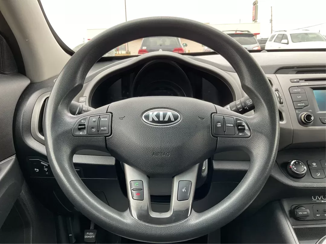 2014 Kia Sportage LX (KNDPBCAC3E7) with an 2.4L I-4 gasoline direct injection engine, located at 880 E. National Road, Vandalia, OH, 45377, (937) 908-9800, 39.891918, -84.183594 - Photo#15