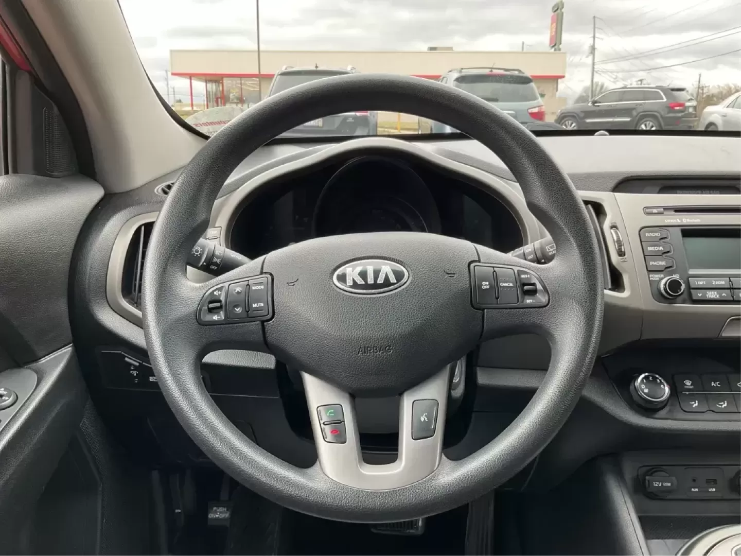 2014 Kia Sportage LX (KNDPB3AC1E7) with an 2.4L I-4 gasoline direct injection engine, located at 1230 East Main St, Xenia, OH, 45385, (937) 908-9800, 39.688026, -83.910172 - Photo#15