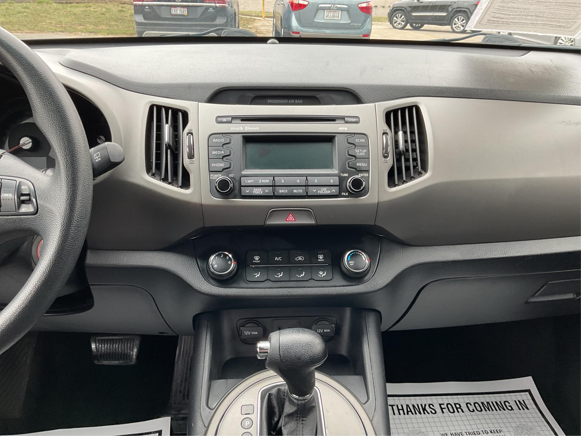 2014 Kia Sportage LX (KNDPB3AC1E7) with an 2.4L I-4 gasoline direct injection engine, located at 8750 N County Rd 25A, Piqua, OH, 45356, (937) 908-9800, 40.164391, -84.232513 - Photo#12