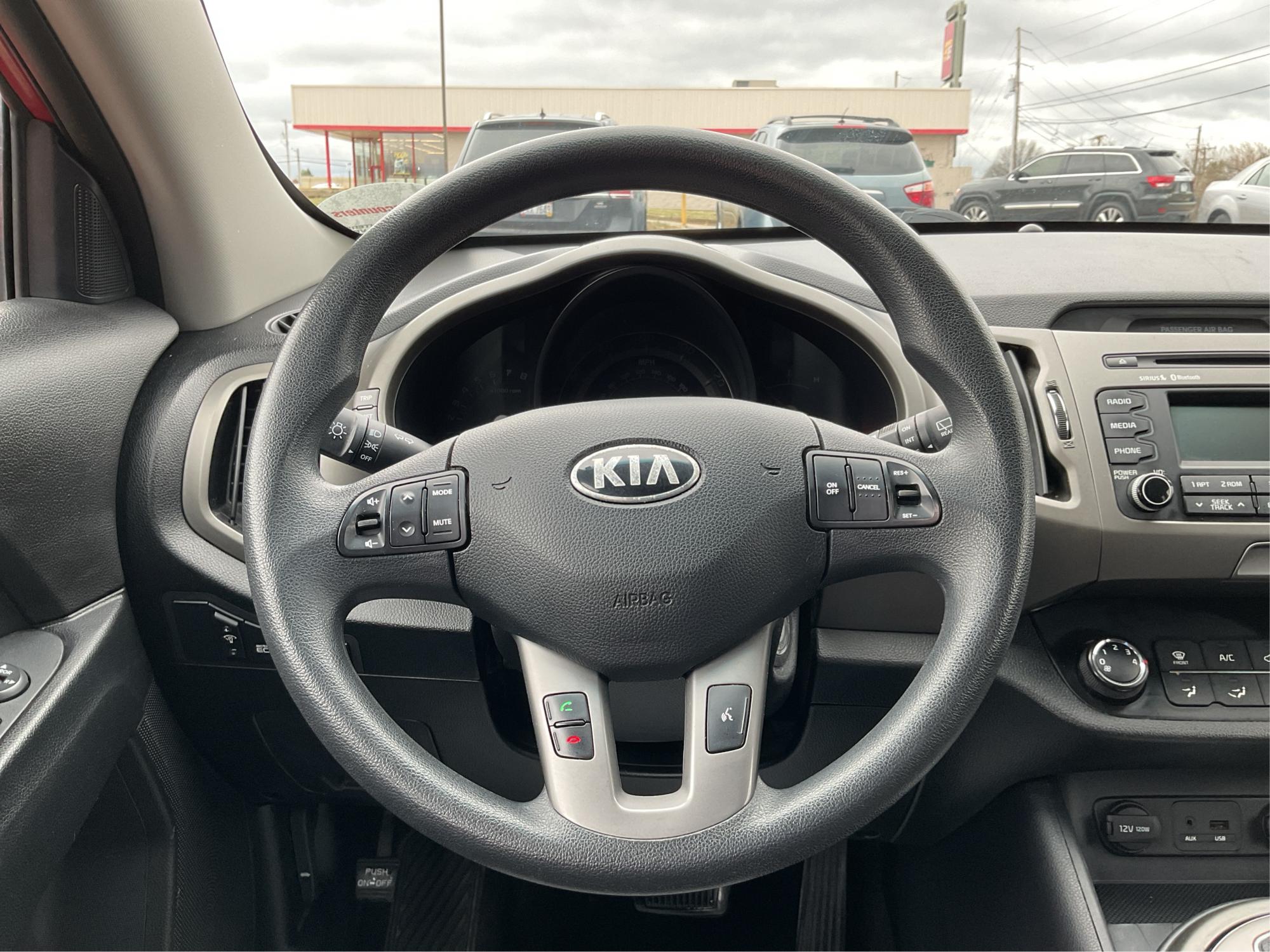 2014 Kia Sportage LX (KNDPB3AC1E7) with an 2.4L I-4 gasoline direct injection engine, located at 8750 N County Rd 25A, Piqua, OH, 45356, (937) 908-9800, 40.164391, -84.232513 - Photo#15